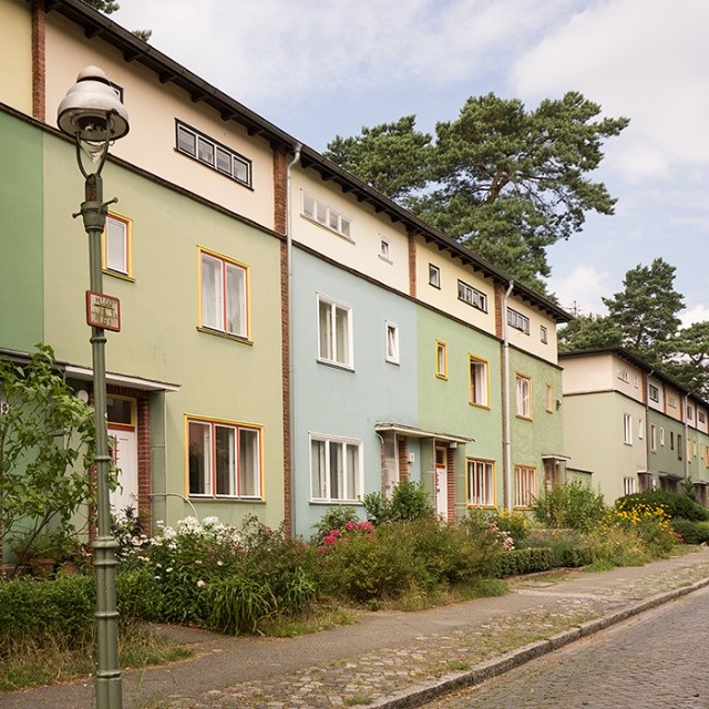 or  designed by  and constructed between 1926 and 1932.   in a  version: the individual must submit to the collective, private property is problematic, command economic allocation of scarce resources is the ideal. The settlement was made for workers and their families.